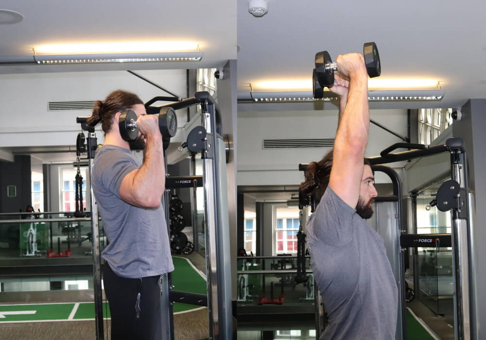 Tập Hammer Curl to Overhead Press.